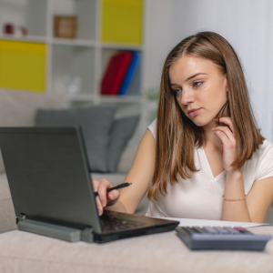 Girl concentrating on laptop screen
